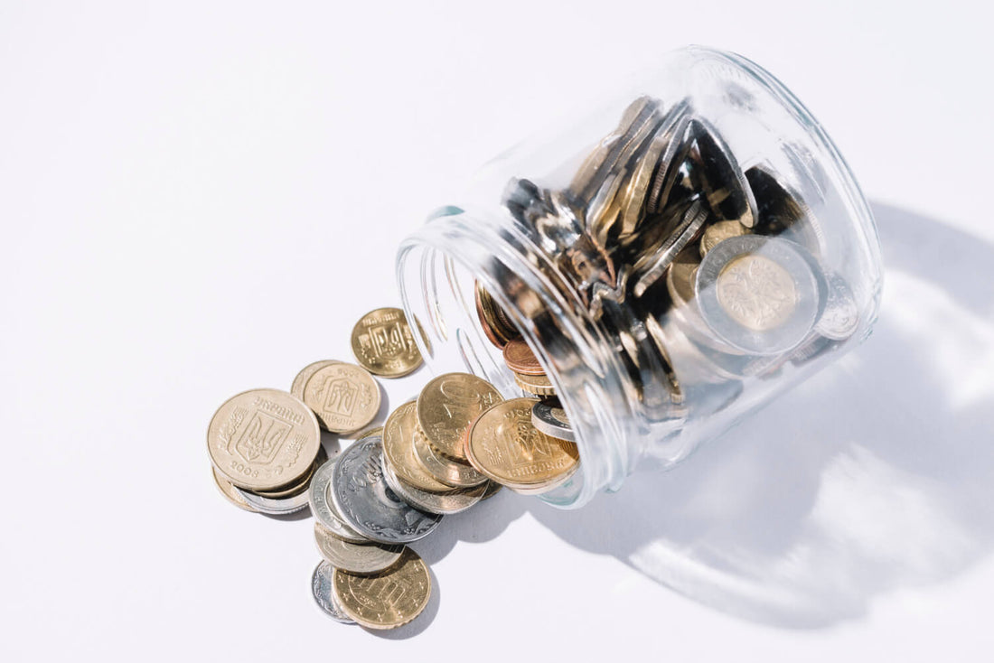 Money flowing from a jar